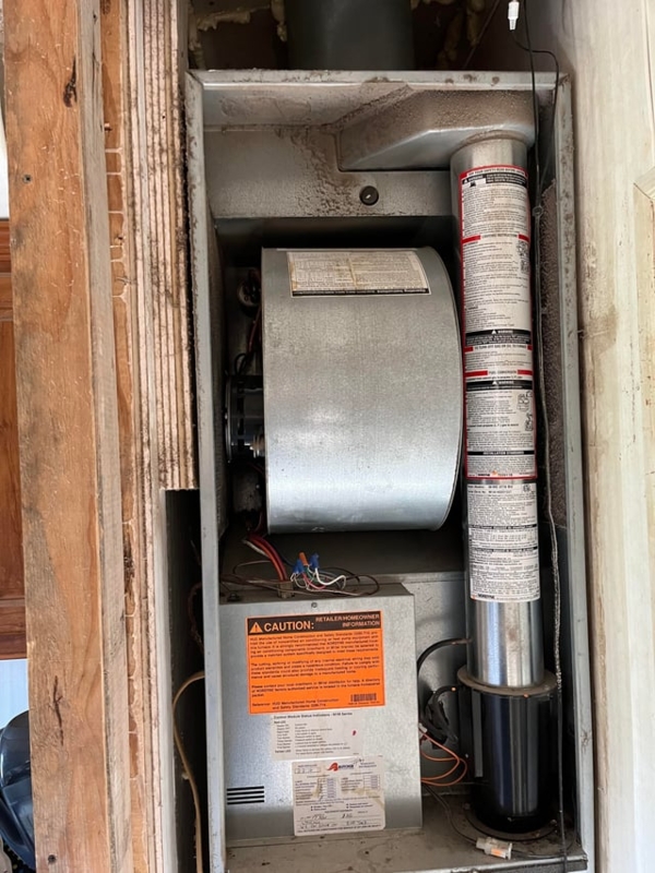 Furnace Interior View showing Galvanized Metal Blower Fan Assembly