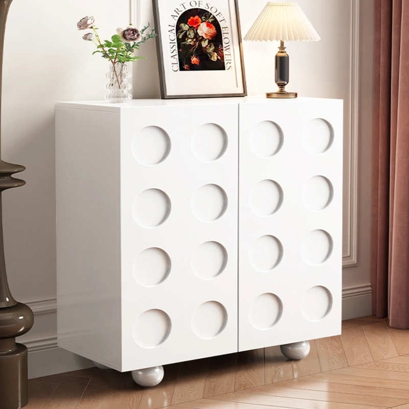 Geometric Relief Shoe Cabinet with Recessed Circles and Ball Feet