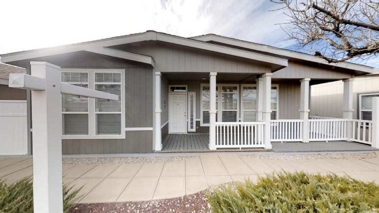 Gray Manufactured Home Vertical Siding Large Porch Picket Railing Pavers