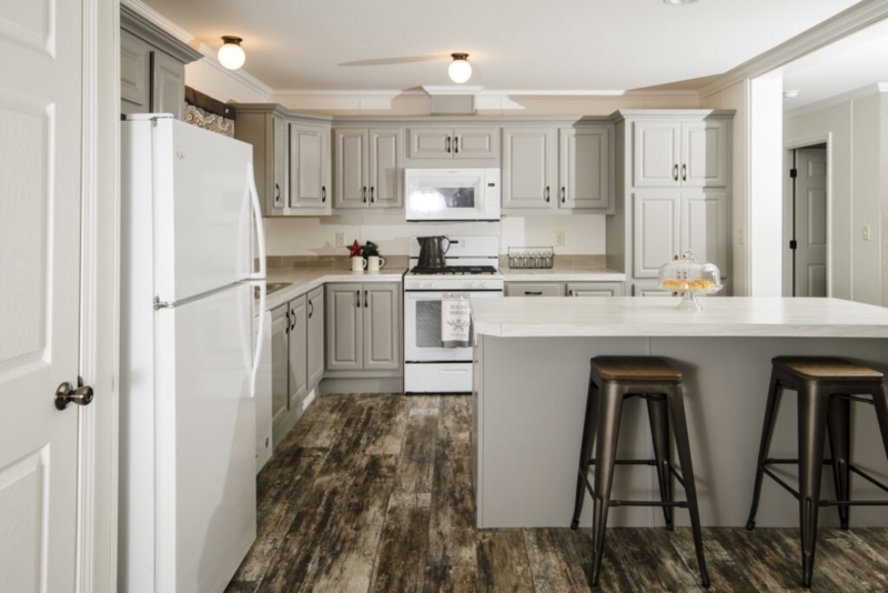 Gray Shaker Cabinetry paired with Distressed Wood Look Flooring