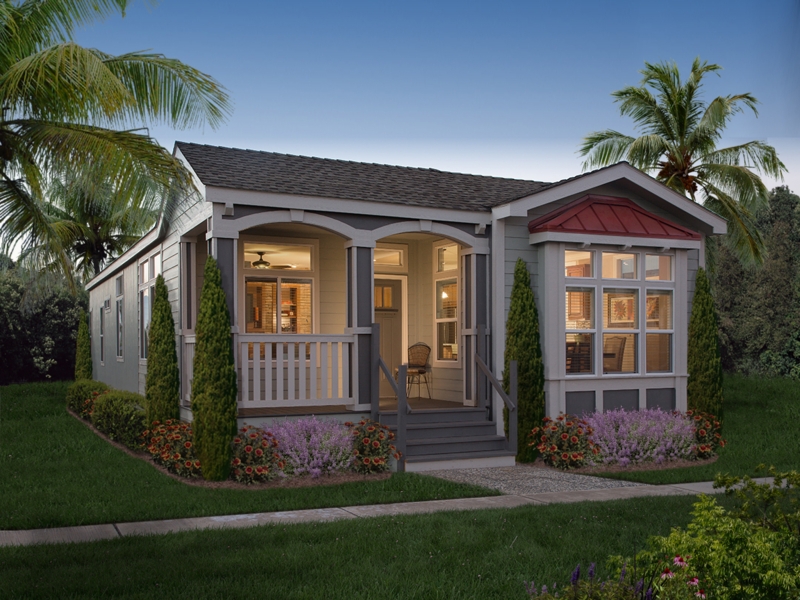 Gray Siding Red Metal Roof Accent on Cottage Style Manufactured Home