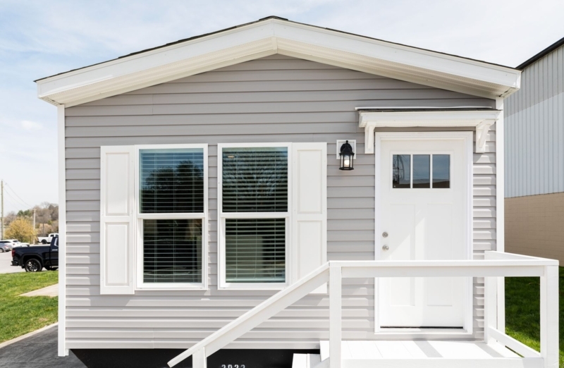 Grey and White Cottage Exterior Tiny Home with Front Loaded Entry