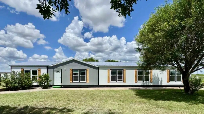 Grey Mobile Home featuring Rustic Wood Shutters