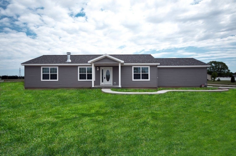 House Charcoal Gray Siding with White Trim and Gabled Porch