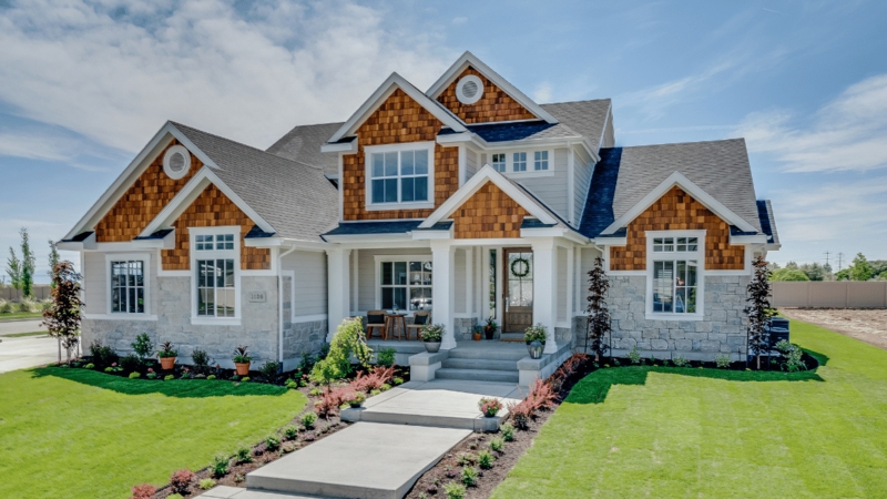 House Exterior with Mixed Siding Home Facade & Stone Veneer Base