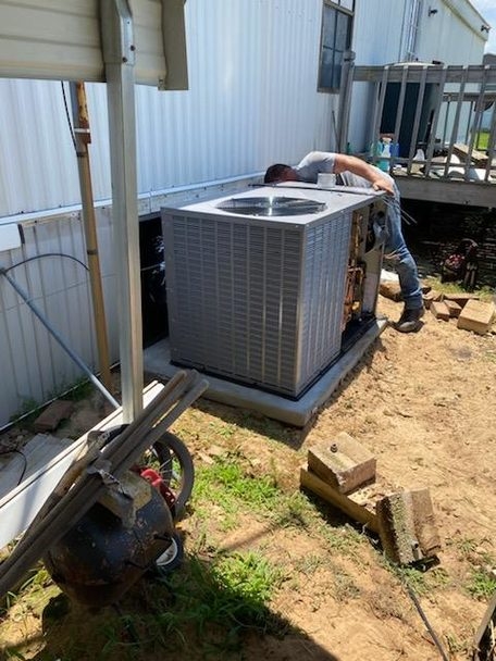 HVAC Package Unit Outdoor Installation on Concrete Base Pad