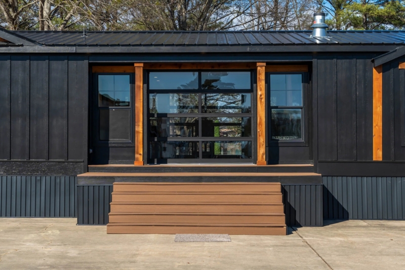 Industrial Style Manufactured Home Facade with Tiered Wood Steps