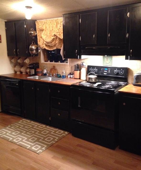 Kitchen Cabinets: Black Kitchen Cabinets with Wood Countertops and Rug