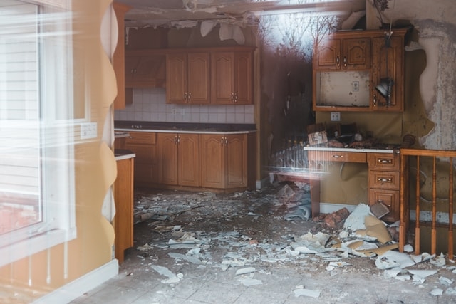 Kitchen Demolition Project: Gutting Old Cabinets in Mobile Home