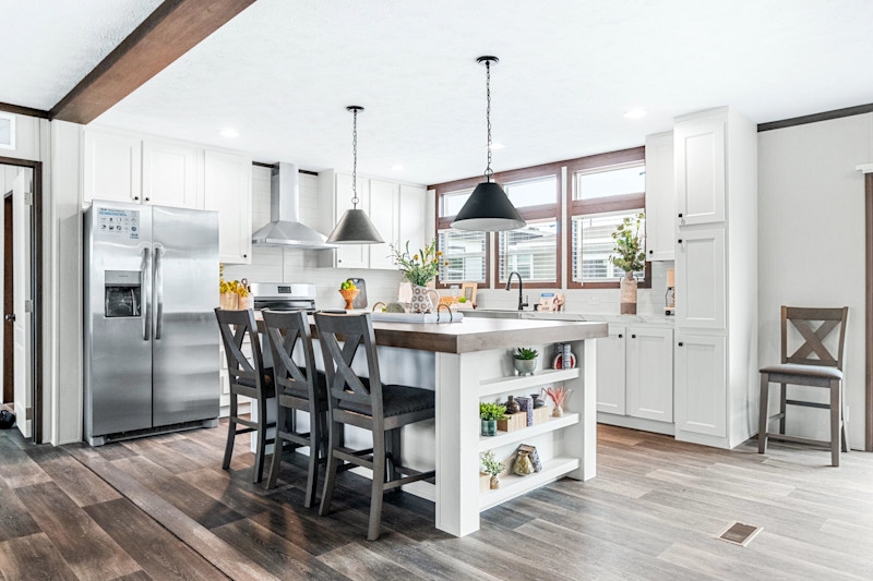 Kitchen Island with Integrated Side Shelving and Grey Cross-Back Stools