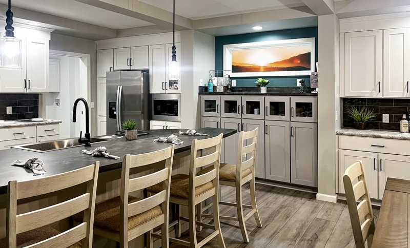 Kitchen Teal Accent Wall Dark Island Top Ladder Back Stools
