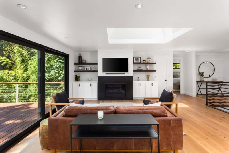 Large Central Skylight: Farmhouse Living Room, Black Fireplace