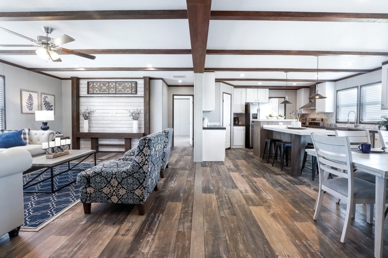 Living Room Exposed Dark Beams Shiplap Media Wall Patterned Accents