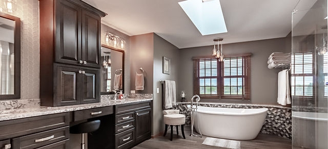 Luxury Master Bathroom with Skylight, Espresso Vanity, and Freestanding Tub