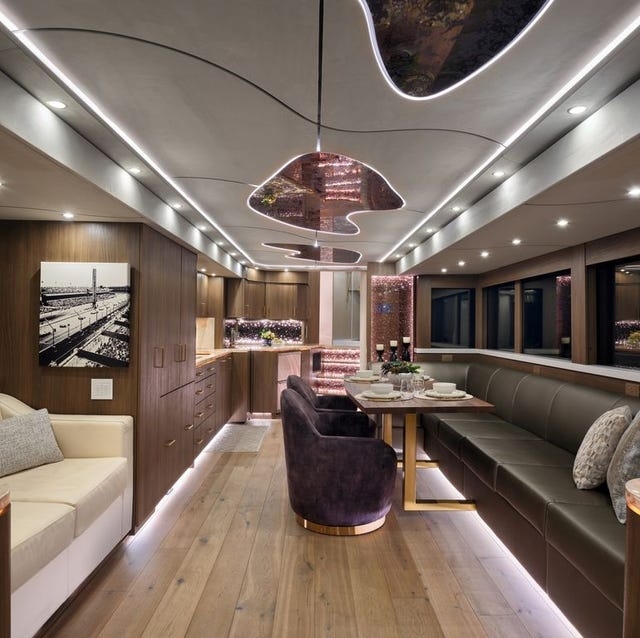 Luxury RV Interior with Integrated LED Lighting and Curved Ceiling