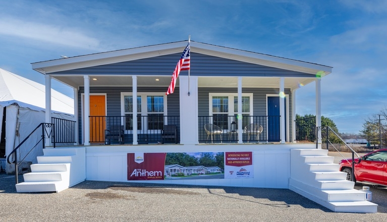 Manufactured Duplex Home with Dual Colored Doors and Full Width Porch