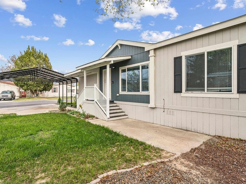 Manufactured Home Contemporary Two Tone Siding with Attached Carport