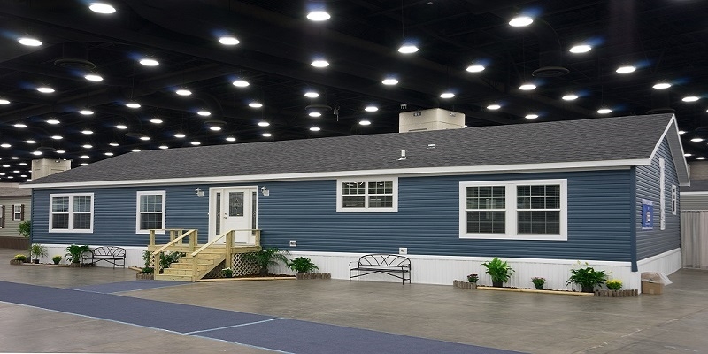 Manufactured Home Display: Slate Blue Siding in Exhibition Hall