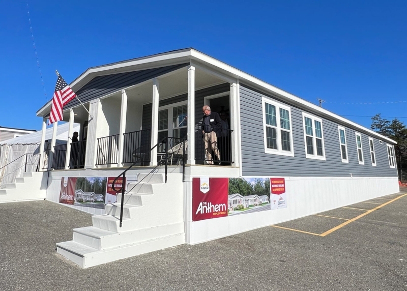 Manufactured Home Duplex Design with Porch Pillars and Slate Gray Siding
