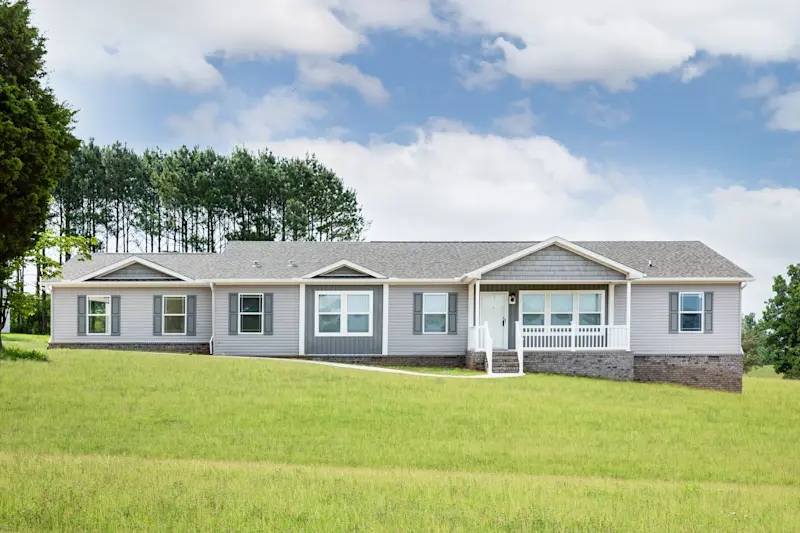 Manufactured Home Exterior Gray Ranch with Stone Veneer Foundation