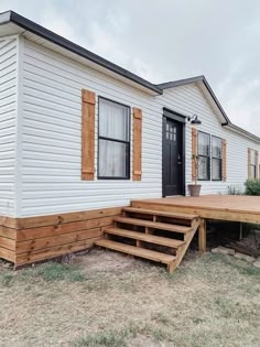 Manufactured Home Exterior: Horizontal Wood Skirting & Farmhouse Shutters