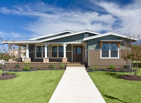Manufactured Home Sage Green Two-Tone Siding with Stone Columns
