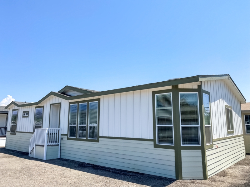 Manufactured Home with Bay Window: White and Sage Green Siding