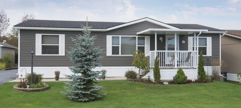 Manufactured Home with Charcoal and White Contrast and Integrated Porch