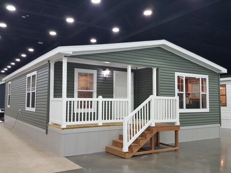 Manufactured Home with Forest Green Siding and Covered Porch