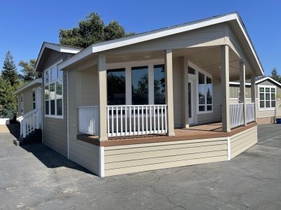 Manufactured Home with Large Transom Windows and Covered Porch