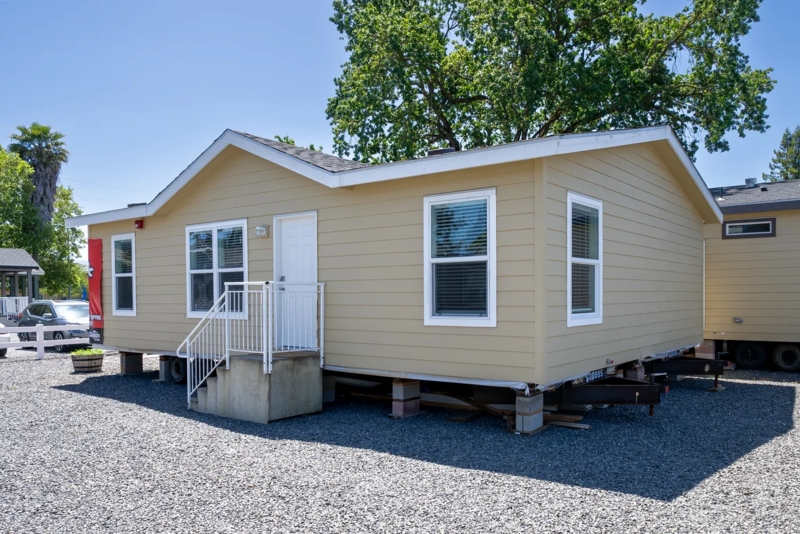 Manufactured Home with Light Yellow Siding and Modular Construction