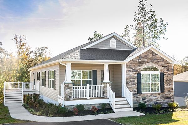Manufactured Home with Mixed Stone Siding, Porch, and Side Deck