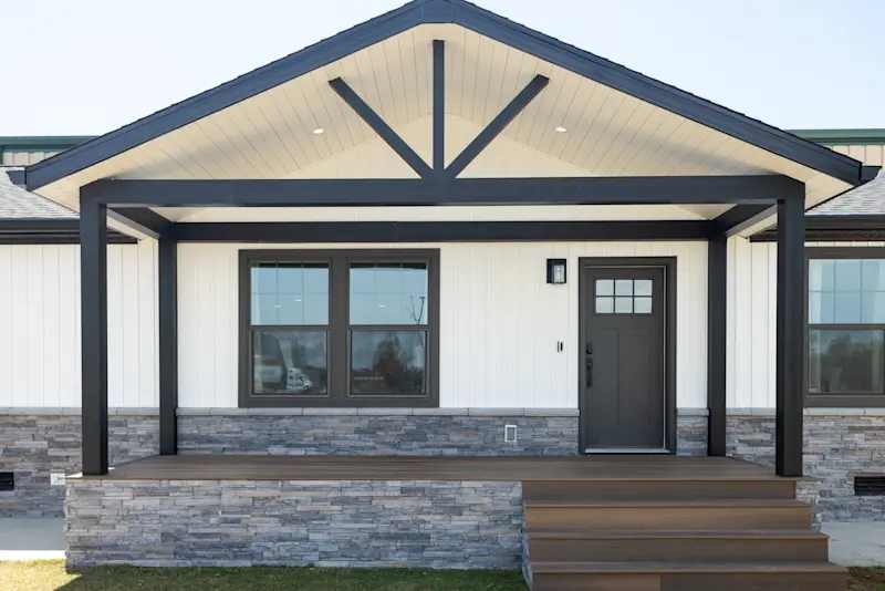 Manufactured Home with Stacked Stone Veneer and Decorative Truss