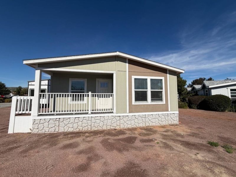 Manufactured Home with Two-Tone Siding and Textured Skirting