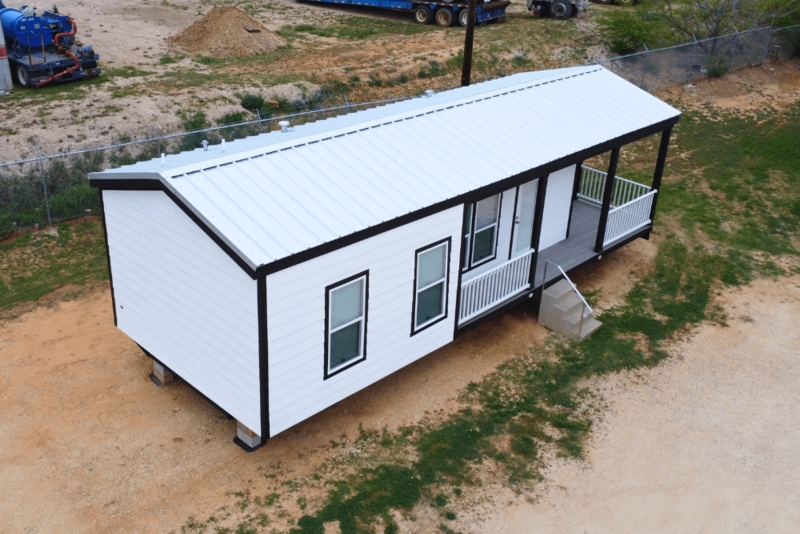 Manufactured Home with White Metal Roof and Black Trim Porch