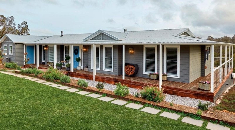 Manufactured Home with Wraparound Porch and Metal Roof