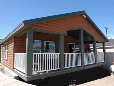 Manufactured Home Wood Toned Siding with White Railing Contrast