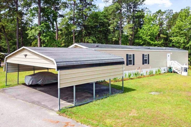 Metal Gabled Roof Carport with Partial Side Walls and Coordinated Siding