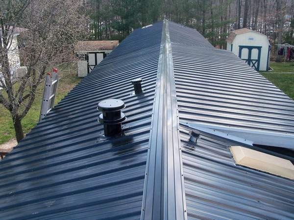Metal Roofing with Integrated Skylight and Ribbed Profile