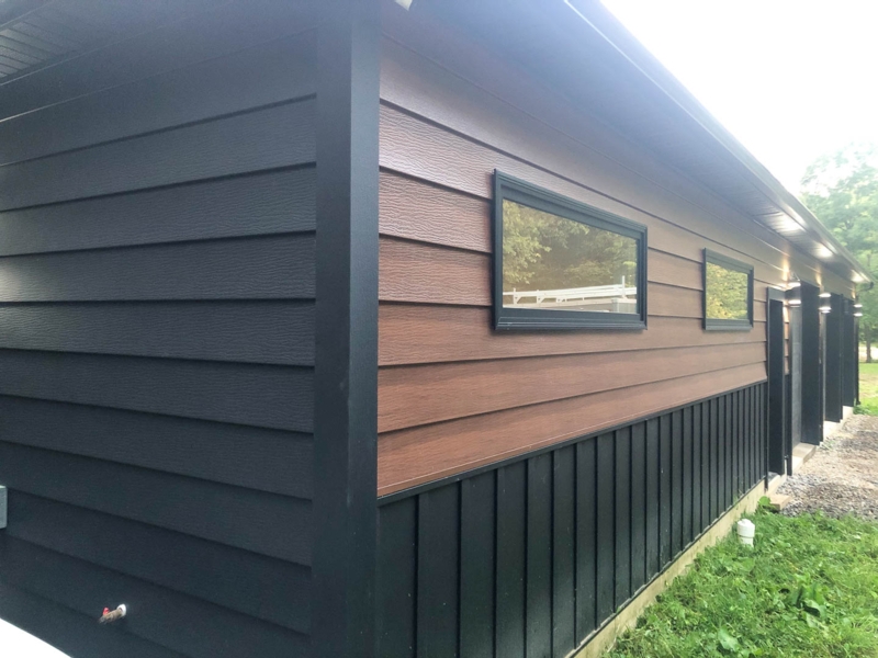 Metal Siding Facade: Mixed Textures, Black & Wood Tones