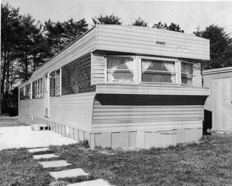 Mid-Century Manufactured Home Design with Overhanging Front Bay