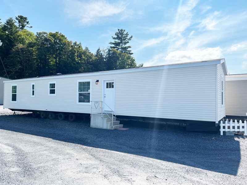 Minimalist Mobile Home Facade Design with White Siding
