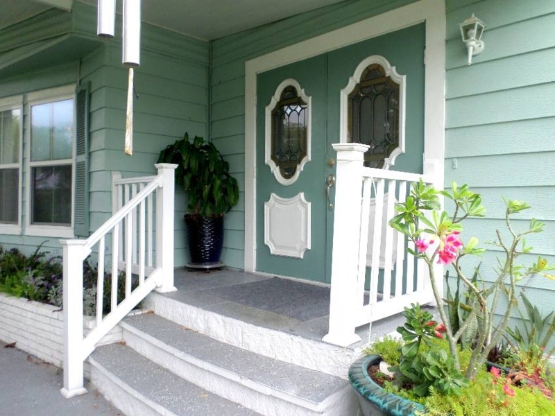 Mint Green Mobile Home Entryway: Teal Double Doors, Porch, & Trim