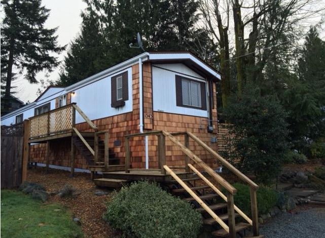 Mobile Home Cedar Shake Siding and Raised Wooden Deck