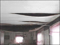 Mobile Home Kitchen: Severely Sagging White Ceiling Panels
