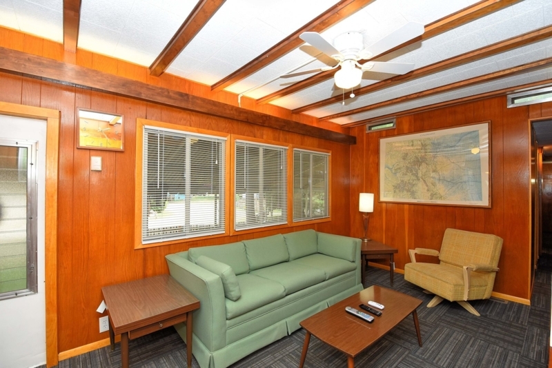 Mobile Home Living Room Wood Paneled Exposed Beams