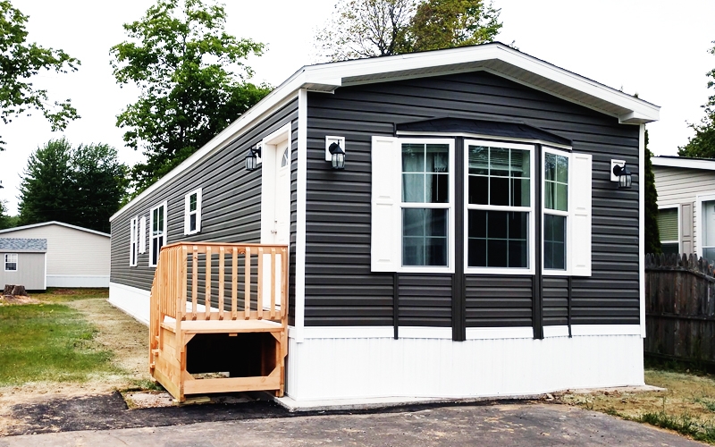 Mobile Home Modern Farmhouse Charcoal Siding Bay Window Wall Lanterns