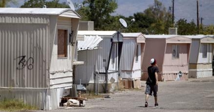 Mobile Home Park Design with Corrugated Metal Siding and Satellite Dishes