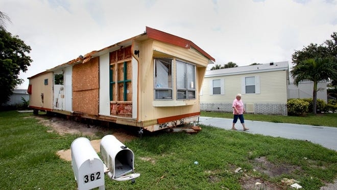 Mobile Home Renovation Project with Exposed Framing and Structural Damage