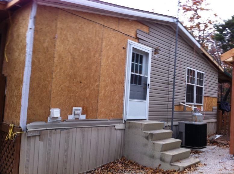 Mobile Home Siding Renovation with Exposed OSB Sheathing